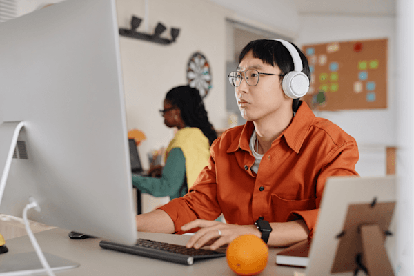 Neurodivergent professional working with headphones