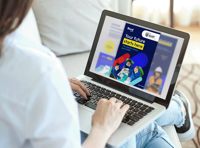 Person looking at the Reed student careers guide on a laptop